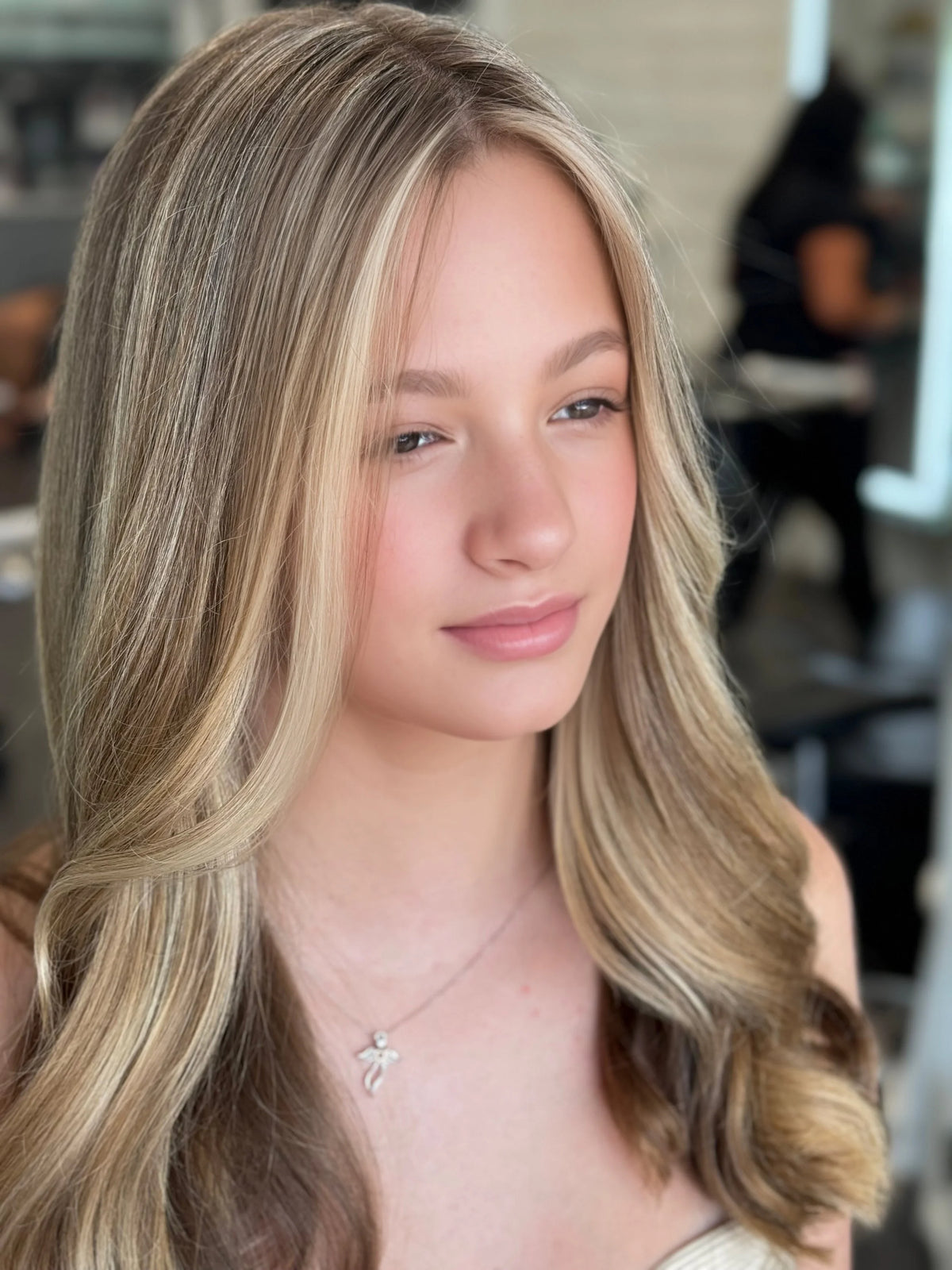 Glowing blonde hair and skin at Wair Studio Salon Marlton